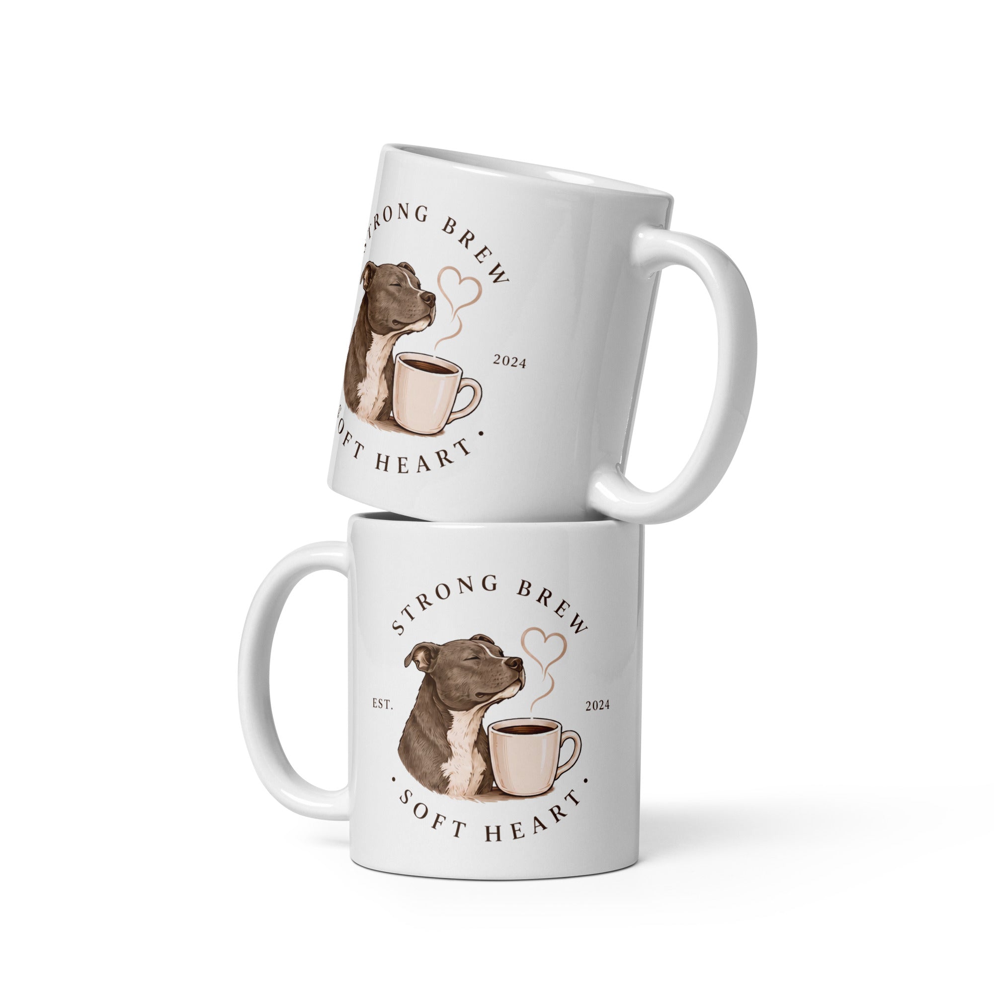Two mugs with staffordshire bull terriers with pink love heart smelling coffee