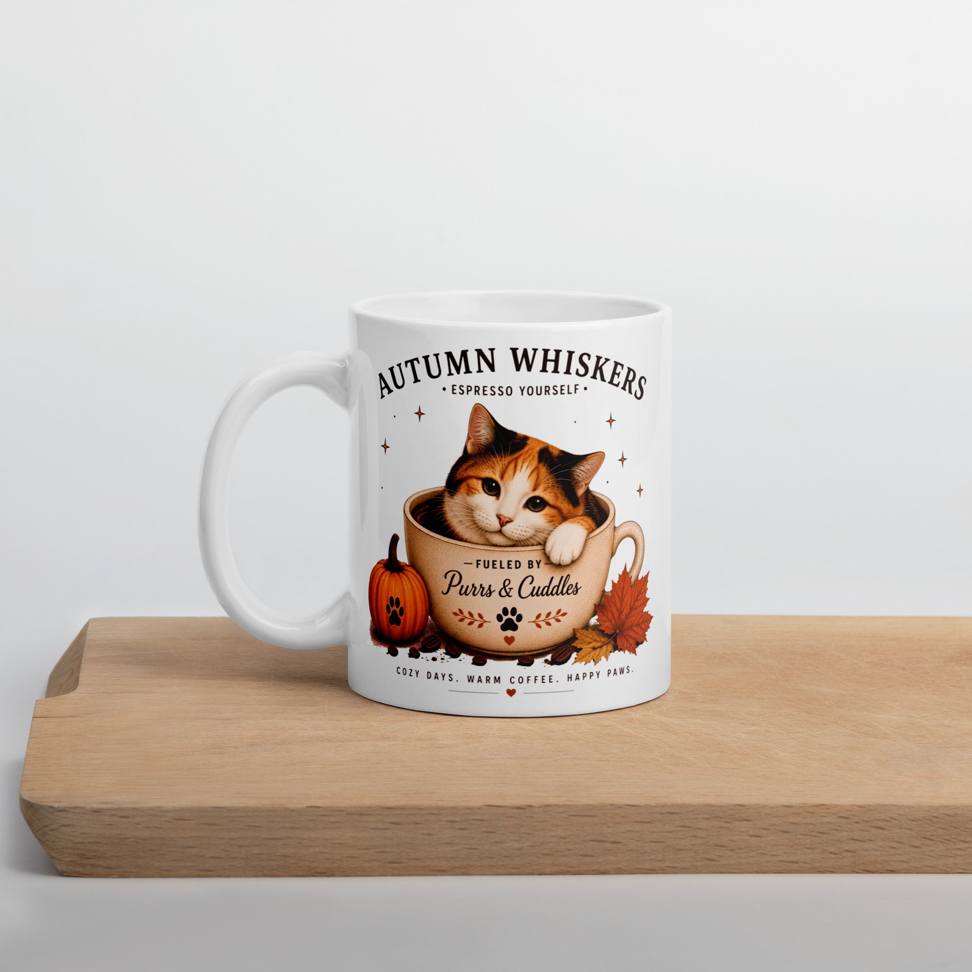Autumn Whiskers Calico Cat Fall Mug featuring a calico cat with autumn-inspired artwork