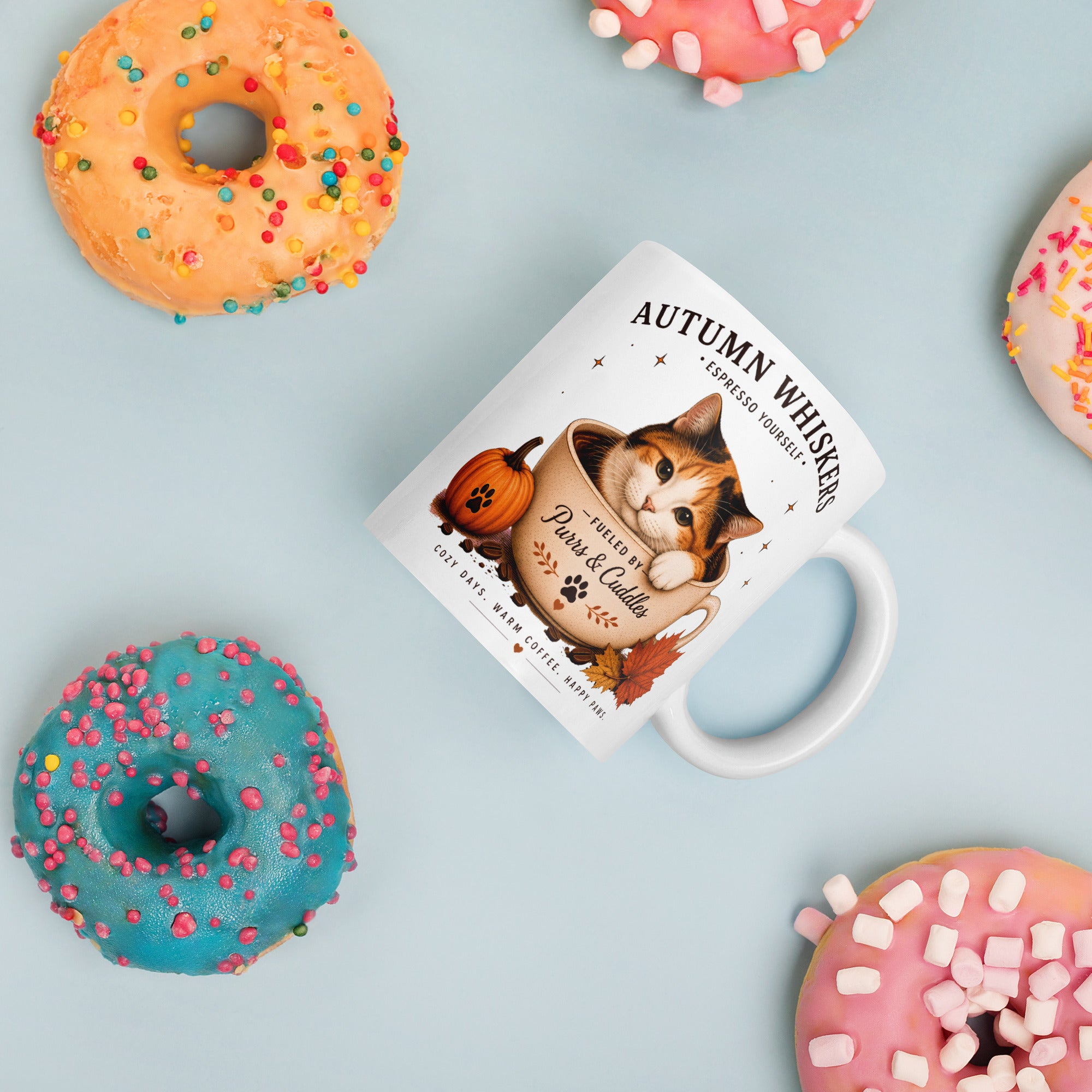 Autumn Whiskers Calico Cat Fall Mug featuring a calico cat with autumn-inspired artwork