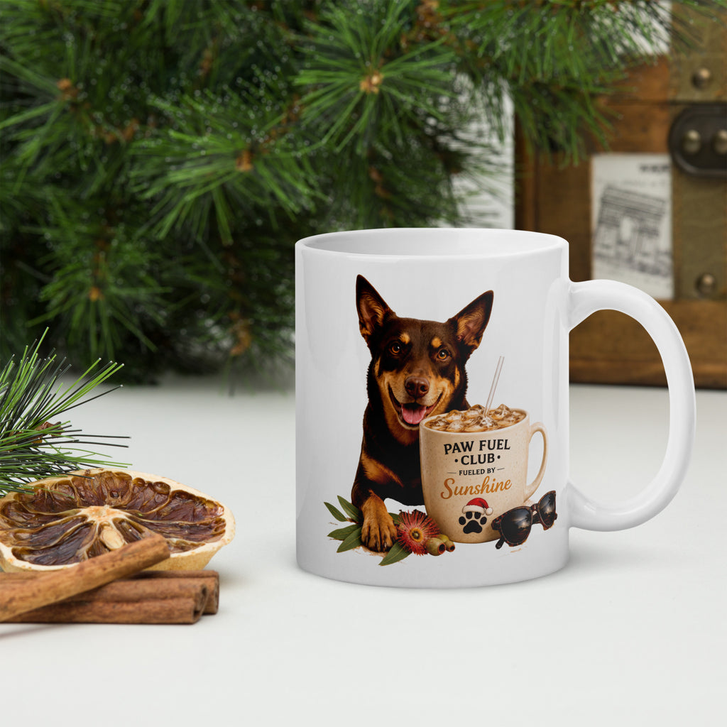 Paw Fuel Club Fueled by Sunshine ceramic coffee mug featuring an Australian Kelpie beside an iced coffee with Australian native flowers by Paw Print Society.